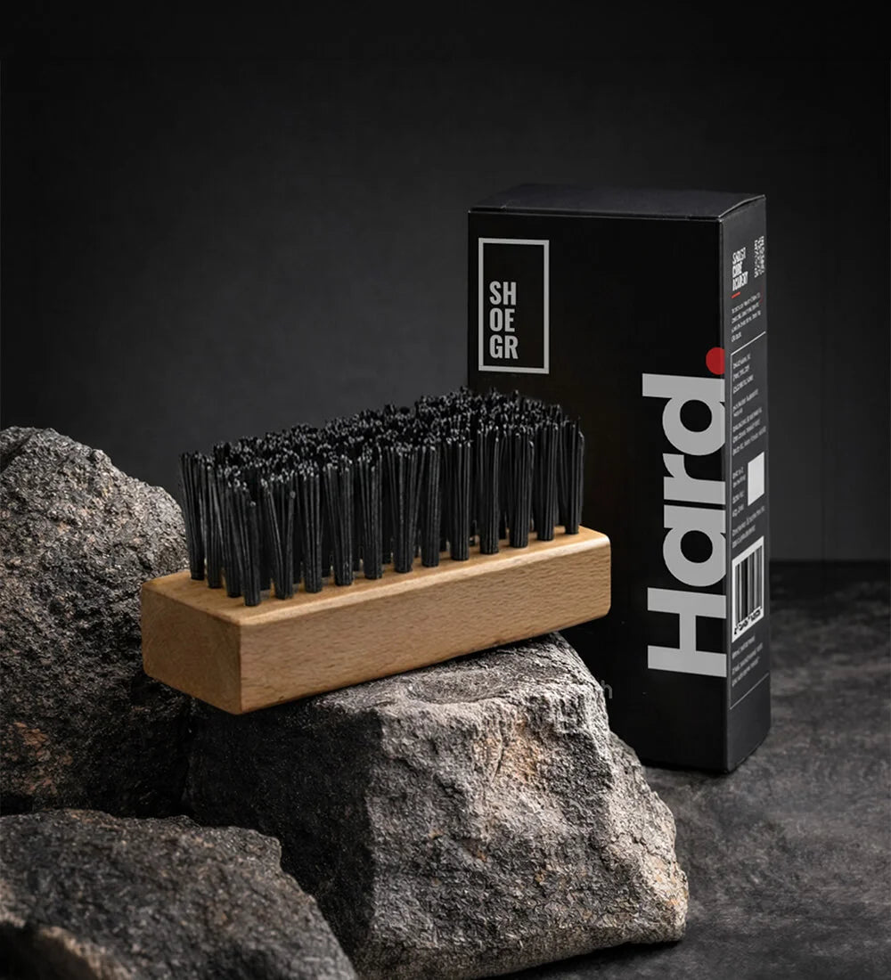 SHOEGR Hard Brush for Cleaning Sneakers and Shoes on a Black Background with its packaging.