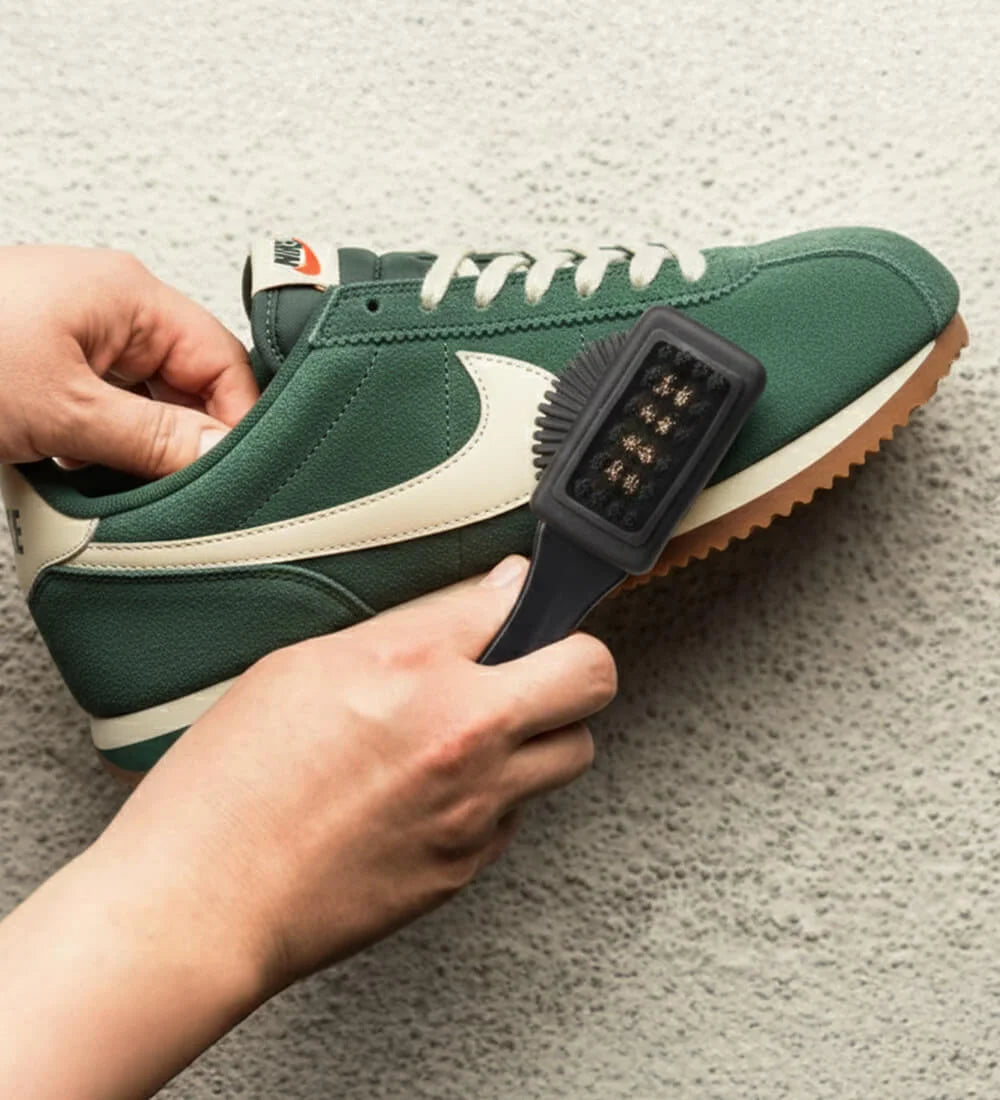 Suede and Nubuck brush cleaning Nike sneaker.